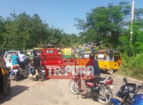 Road blockade at Udaipur-Amarpur road demanding road repairing